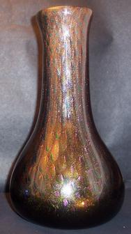 Blown glass: Dichroic glass has a transmitted color and a totally different reflective color.