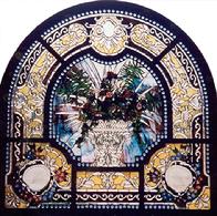 The intricate design in "Beveled Bouquet" contains many wheel-cut bevels. Approximately 7 1/2' X 7 1/2'. Two rows of antique jewels grace its inside and outside borders. A lovely floral bouquet in a beveled vase.