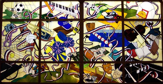 This window is part of the Iowa Hall of Pride project in Des Moines, Iowa. This window portrays Iowa High School sports. It measures 12' x 23'